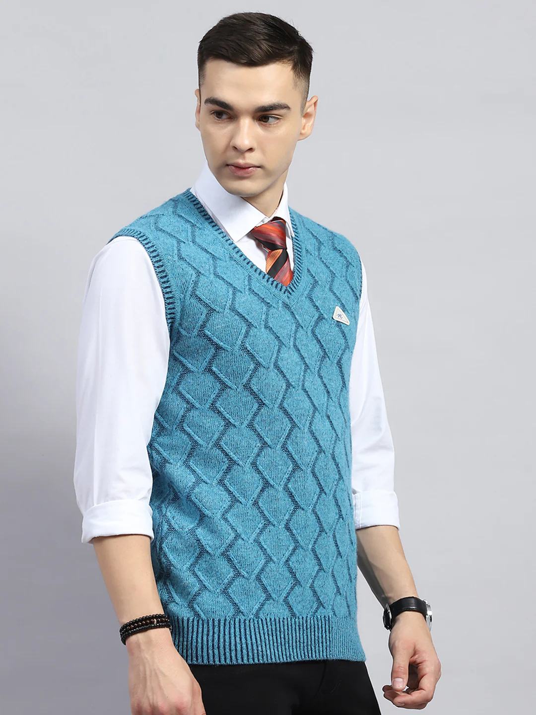 Men Blue Self Design V Neck Sleeveless Sweater - Image 4