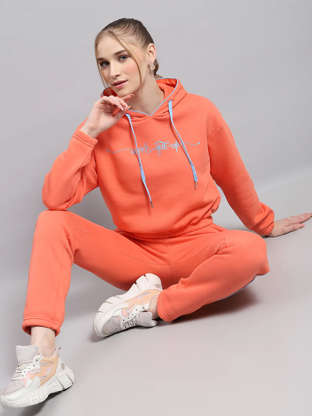 Women Peach Printed Hooded Full Sleeve Tracksuit - Image 2