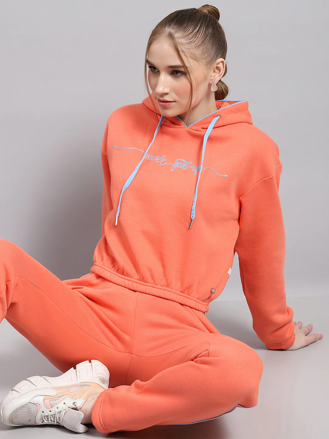 Women Peach Printed Hooded Full Sleeve Tracksuit - Image 6